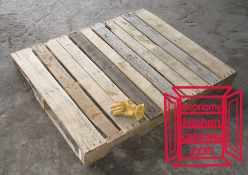 Wooden pallet. Glove for scale.